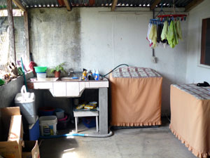 The laundry area is large and partly open. 