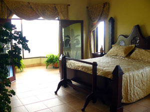 The glass vista room is entered frm the lake side of the master suite.