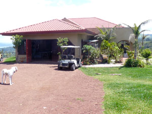 The long and lovely entry driveway ends at this large parkig area. 