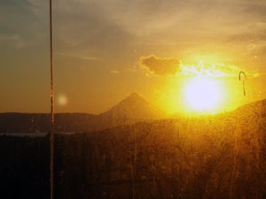 A spectacular sunrise behind Arenal Volcano s seen from the glass viewng room that is part of the master suite. 