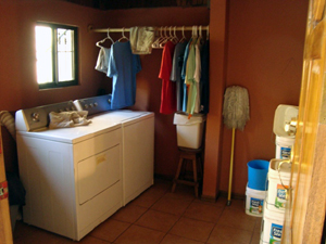 The laundry is a large room with baoth washer and dryer.