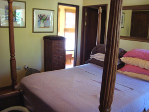 The master suite is one of 4 furnished bedrooms.