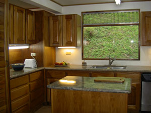 New granite countertops have been installed to complete a wonderful kitchen remodel.