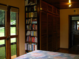 The master suite has large windows and French doors. 