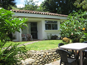 The guest cabina has a secluded garden setting.