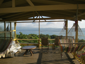 The spacious satellite roofed deck has wonderful views of the north half of the lake and the surrounding mountains. 