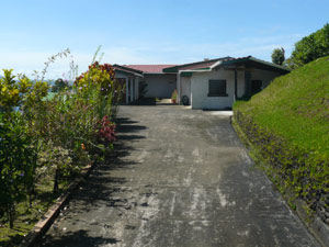 There's plenty of parking as well as two carports - one on either side of the courtyard - and a locking garage.