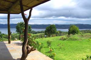 An Aguacate home has a great view of Lake Arenal and the southern hills.