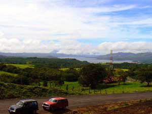 Lake Arenal is visible from the Sabalito area. 