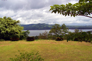 The level lot is has lots of trees and also great views of Lake Arenal.