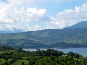 This shot combines the northern flank of Tenorio with the southern flank of another dormant volcano, Miravalles, notable for the production of thermal energy.