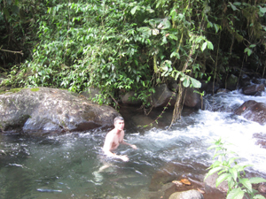 Enjoying the Rio Piedras Negras, the stream in the forest below the lot.