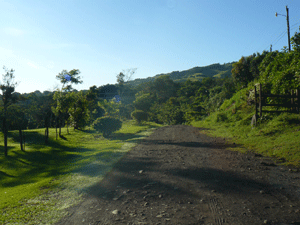 The road continues past the lot on its way to the village of Tronadora, which is more usually reached by the paved lake highway.