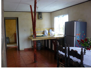 The kitchen is fairly large and has views toward the volcano.