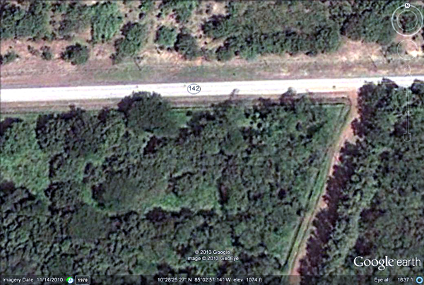 The lot fronts the Canas/Tilaran highway and has a secondary road on the west side.
