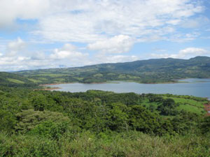 Further north, the view takes in the windsurfing end of the lake and the village of Rio Piedras.