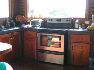 It has modern appliances in the attractive kitchen.