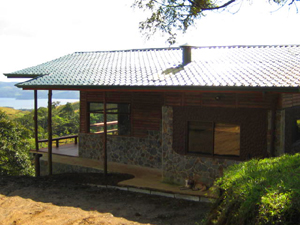 A veranda ehances enjoyment of the balmy outdoors and the views.