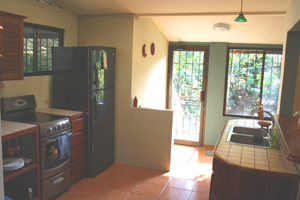 The kitchen with door to patio.