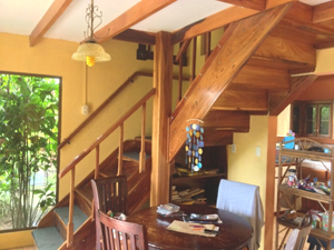 Stairs of beautiful Costa Rican hardwoods lead to the second floor.