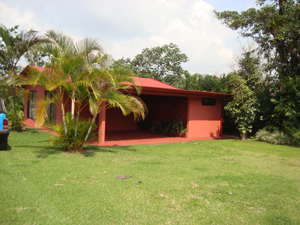 Pretty lawns surround the house.