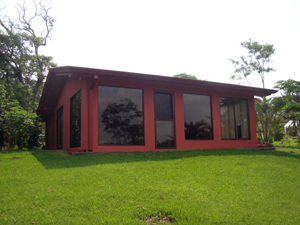 The large windows provide an excellent view of the nearby cove.