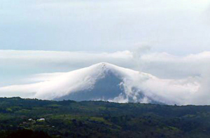 The volcano wears a fleecy cap.